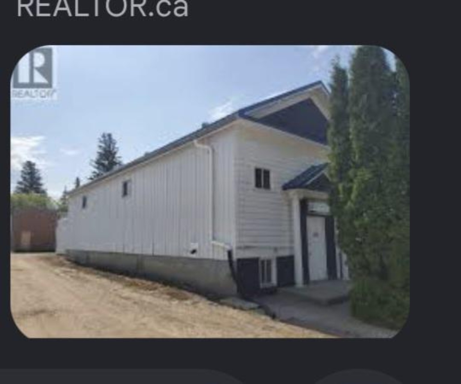 Real photograph of the existing building at 242 Third Ave South in Kamsack